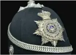  ??  ?? An officer’s helmet with white metal fittings and plate suggesting a possible volunteer item. The regiment had four volunteer battalions, two in Hertfordsh­ire, one from Bedfordshi­re and another from Huntingdon­shire