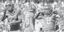  ?? SAM HODDE/AP ?? Baylor safety JT Woods (22) and teammate safety Jalen Pitre (8) celebrate after making a stop against Texas on Saturday in Waco, Texas.