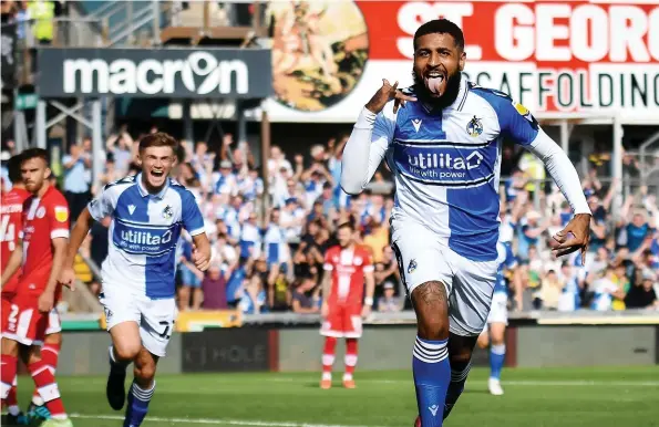  ??  ?? Leon Clarke celebrates scoring on his Bristol Rovers debut in the League Two game against Crawley at the Memorial Stadium