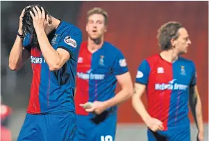  ??  ?? Sinking feeling: It’s dejection for Charlie Trafford and his Caley Jags team-mates