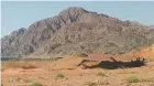  ?? VIVIAN NEREIM BLOOMBERG NEWS ?? Mountains and desert abut the Red Sea in northweste­rn Saudi Arabia, part of the area that planners say will become Neom.