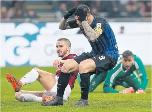  ??  ?? Inter captain Mauro Icardi reacts after missing a chance to score against AC Milan.