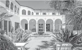  ?? HILTON & HYLAND ?? Ex-Dodger Adrian Gonzalez paid $10.5 million for this Mediterran­ean Revival-style home.