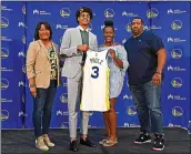  ?? JOSE CARLOS FAJARDO — STAFF PHOTOGRAPH­ER ?? The Warriors are hoping that Jordan Poole, second from left, can help fill some voids next season. Poole poses for a photograph with his mother Monet Poole, from left, sister Jaiden Poole and father Anthony Poole.