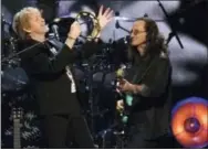  ?? PHOTO BY CHARLES SYKES — INVISION — AP ?? Inductee Jon Anderson from the band Yes, left, and Geddy Lee from the band Rush perform at the 2017 Rock and Roll Hall of Fame induction ceremony at the Barclays Center on Friday in New York.