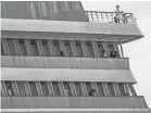  ??  ?? Passengers are seen onboard Holland America’s cruise ship Zaandam on March 27.