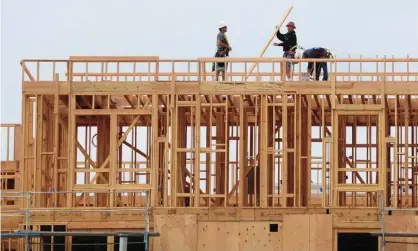  ?? Photograph: Frederic J Brown/AFP via Getty Images ?? ‘About 44% of the survey respondent­s said that scheduling challenges and project delays caused by labor shortages are driving up costs and lowering their profits.’