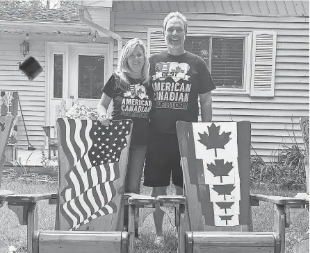  ?? PROVIDED BY KIM THOMPSON ?? Kim Thompson and boyfriend Art Malott in front of his home in Canada. They are frustrated that the United States has not opened the border so that Malott can drive to Detroit to visit Thompson in Ferndale, Mich.