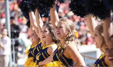  ?? COURTESY OF MATT HA ?? Melissa Martin, center, suffered a concussion while on the UC Berkeley cheerleadi­ng team from 2017-2018.
