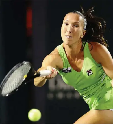  ??  ?? Tough fight: Jelena Jankovic returns a shot to Venus Williams at the Family Circle Cup tournament in Charleston. — AP