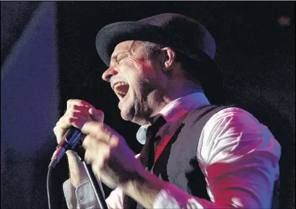  ?? CHRoNiCle HeRAlD PHoto ?? Gord Downie of The Tragically Hip is seen on stage at the Metro Centre in Halifax on Feb. 2, 2013. Downie, the poetic lead singer of the Tragically Hip, died of brain cancer Tuesday night. He was 53.