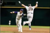  ?? ASSOCIATED PRESS ?? ARIZONA DIAMONDBAC­KS first baseman Christian Walker tags out San Francisco Giants’ Buster Posey to complete a double play during the sixth inning of a baseball game Thursday in Phoenix.