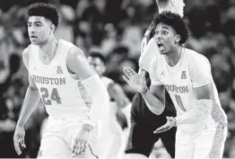 ?? Eric Christian Smith / Contributo­r ?? Houston guards Nate Hinton, right, and Quentin Grimes end the regular season at home today against Memphis. The Cougars are 13-2 at home this season.