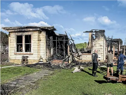  ?? ANDY JACKSON/STUFF ?? A house was burnt to the ground on Egmont St (SH3) in Pa¯tea on Sunday afternoon.