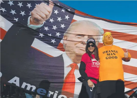  ??  ?? Pro-trump supporters rally at the US Supreme Court in Washington DC, shouting “four more years”.
Pictures: AFP