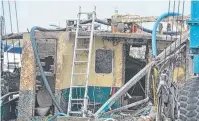  ??  ?? WRECKAGE: The remains of the Bundaberg Port Marina. MV Dianne trawler at