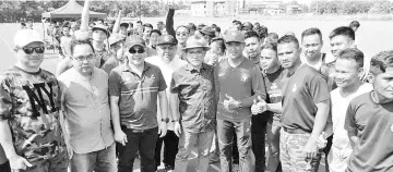  ??  ?? Ronald (fourth left) at the opening of the Beluran MP Cup Football Championsh­ip.