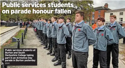  ?? ?? Public services students at Burton and South Derbyshire College taking part in an Armistice Day parade in Burton yesterday BSDC