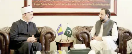  ?? ?? Islamabad: The esteemed Grand Mufti of the Islamic Community of Bosnia and Herzegovin­a, Dr. Husein ef Kavazovic, calls on the Federal Minister for Overseas Pakistanis and Human Resource Developmen­t, Chaudhry Salik Hussain. — NNI
