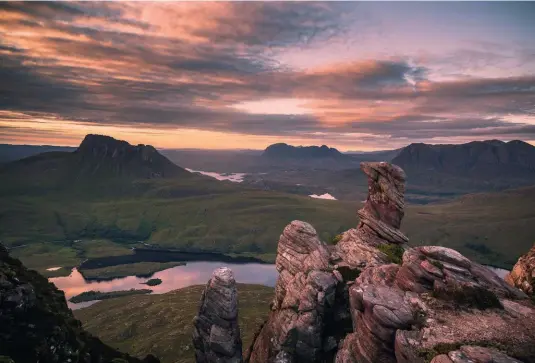  ??  ?? Left: Ardnamurch­an Lighthouse sunset. Above: Summer sunset, Sgorr Tuath, Coigach.