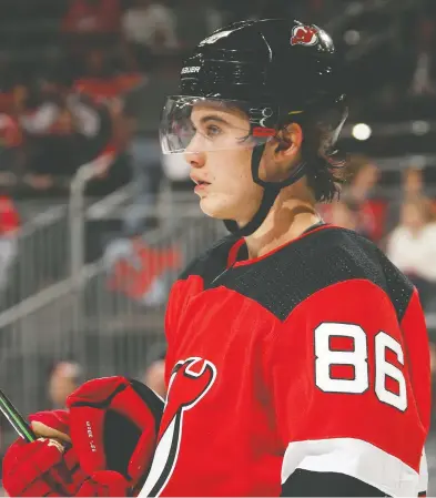  ?? BRUCE BENNETT / GETTY IMAGES FILES ?? Former first-overall draft pick Jack Hughes had 21 points for the New Jersey Devils when the
NHL season paused due to coronaviru­s. The one-time scoring prodigy has tallied just seven goals in 61 games.