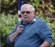  ??  ?? Frank Strunk says a few words after being honored with the Glass Tear Hero Award on Saturday. The ceremony, held in Memorial Park, honored local veterans for their service.