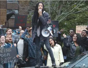  ?? Associated Press photo ?? This image released by Universal Pictures shows Lex Scott Davis in a scene from “The First Purge.”