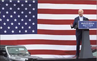  ?? Lori King / Associated Press ?? Presidenti­al candidate Joe Biden speaks at a drive-in rally at UAW Local 14 in Toledo, Ohio, on Monday.