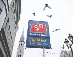  ?? CHRISTINNE MUSCHI / REUTERS ?? The Quebec-based retailer Couche-tard is in merger
talks with French grocery giant Carrefour.