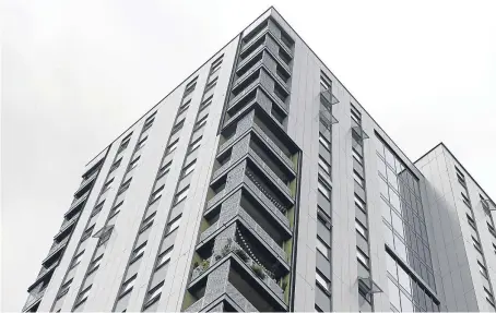  ?? Picture: PA. ?? Residents of Rivers Apartments in Tottenham, north London, have been told there will be an immediate review of the exterior cladding on their tower block.