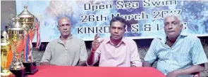  ?? PIX BY SAMANTHA PERERA ?? Kinross Swimming and Life Saving Club Media Spokesman B S Lakmal (C) addressing the media. Also in the picture are Kinross Past President B R A Fernando (L) and Chairman Six-mile Swim Sub-committee Susil Perera (R)