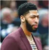  ?? KAMIL KRZACZYNSK­I-USA TODAY SPORTS ?? NEW ORLEANS PELICANS forward Anthony DAVIS looks on from the side lines during the first half at United Center.