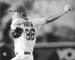  ?? Stephen Dunn Getty Images ?? JERED WEAVER has allowed an American League-leading 16 home runs this season, putting him on pace to surpass the 27 homers he gave up in 2014.