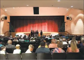  ?? Jeff Mill / Hearst Connecticu­t Media ?? Lt. Gov. Susan Bysiewicz and state Commission­er of Veterans Affairs Thomas J. Saadi came to Cromwell High School on Monday to honor “brave Americans who answered the call to duty” in Vietnam.