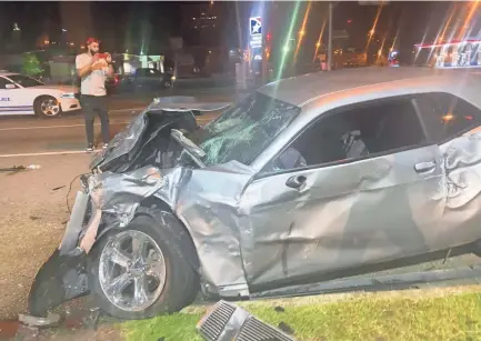  ?? COURTESY OF JOE CRAIG JR. ?? A photo of Joe Craig Jr.'s Dodge Challenger after an Aug. 22 car accident that left the former Memphis wide receiver temporaril­y paralyzed.