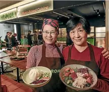  ??  ?? Aroha co-owner Yingjie Zhang, left, and chef Sylvia Wu.