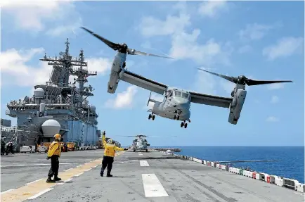  ?? PHOTO: REUTERS ?? A Marine Corps MV-22B Osprey takes off from the USS Kearsarge aircraft carrier as US military continues to evacuate personnel from the US Virgin Islands in advance of Hurricane Maria.