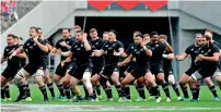  ?? AP file ?? The All Blacks perform a haka prior to the start of their rugby test against Japan. —