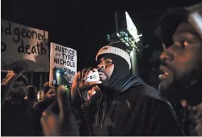  ?? CHRIS DAY/THE JACKSON SUN ?? Antonio Cathey speaks as demonstrat­ors block traffic on Interstate 55 at the Memphis-arkansas Bridge as they protest the killing of Tyre Nichols on Jan. 27 in Memphis.