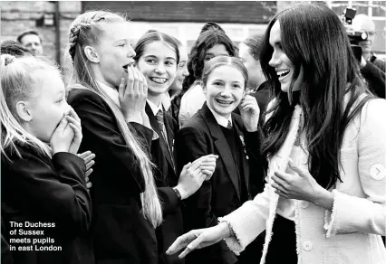  ??  ?? The Duchess of Sussex meets pupils in east London