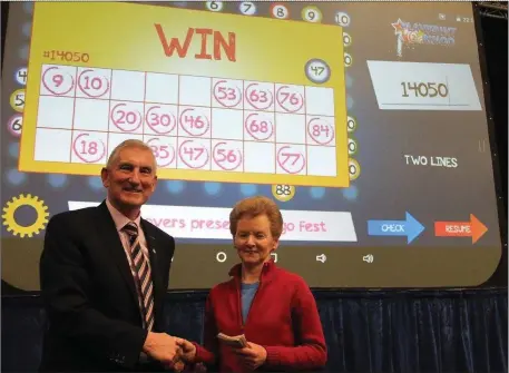  ??  ?? Ann O’Malley from Kilmovee, who won the jackpot of € 1,400 with Vincent Nally.