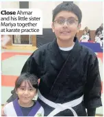  ??  ?? Close Ahmar and his little sister Mariya together at karate practice