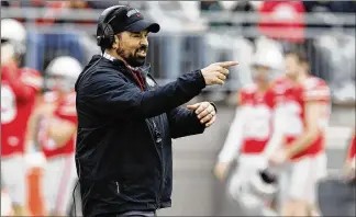  ?? JAY LAPRETE / AP ?? Over a dozen scholarshi­p players have left the Ohio State program to play elsewhere since last December, a figure much larger than the first three offseasons of Ryan Day’s tenure as head coach.