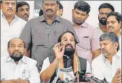  ?? PTI ?? Telangana Congress president N Uttam Kumar Reddy (centre) addresses the media. There are many claimants to the CM’S post in the Congress with Reddy and working president A Revanth Reddy leading the race