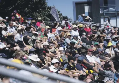  ?? PHOTOS: ROBERT KITCHIN/THE POST ?? The colourful crowd at day two of the Australia/New Zealand cricket test at the Basin Reserve yesterday.