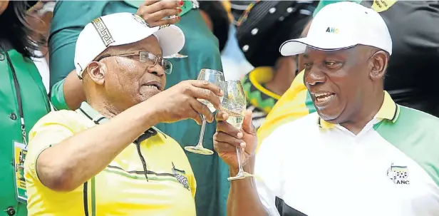  ?? Picture: Jackie Clausen ?? Former president Jacob Zuma and President Cyril Ramaphosa raise a toast to unity in the ANC as the party prepared to unveil its election manifesto at celebratio­ns in Durban.