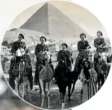  ?? ANDY JACKSON/ STUFF ?? Ron Bingham, 98, says Anzac Day is worth attending, rain, hail or shine. Inset, Ron, far left, on on a camel in Egypt.