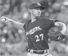  ?? JAY BIGGERSTAF­F / USA TODAY SPORTS ?? Brewers starter Zach Davies has been out with right rotator cuff inflammati­on.