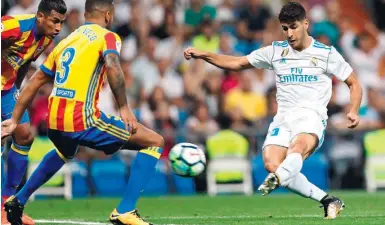  ?? Foto: dpa ?? Rettet für Real mit seinen beiden Toren das Unentschie­den: Marco Asensio.