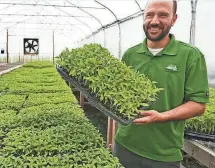  ?? CHARLIE NYE, THE INDIANAPOL­IS STAR ?? Matt Ewer, 37, runs Feel Good Farm, which sells its organic farm produce through Green BEAN Delivery.